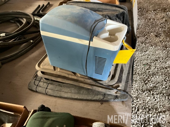 12V cab cooler, floor mats, and a canvas tool bag