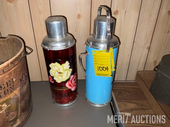 Pair of vintage decorated coffee thermoses
