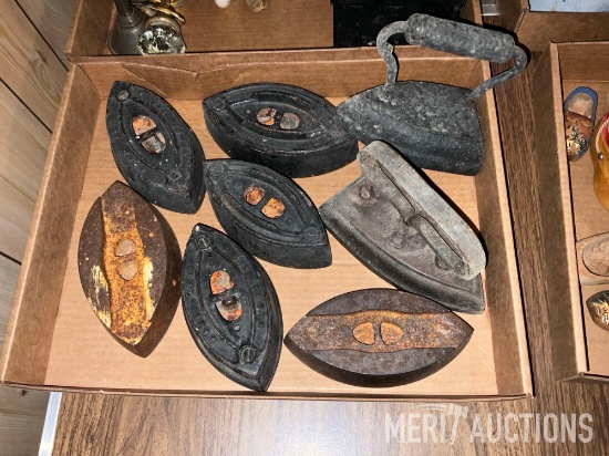 Flat of various antique irons as pictured