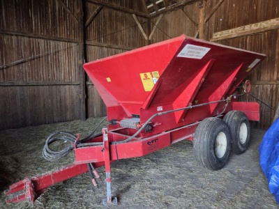 Fertilizer spreader.