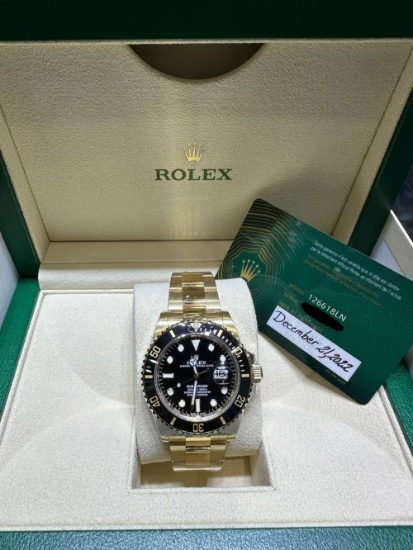 ROLEX 18K BLACK SUB 126618