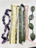 Eight strands of gemstone beads