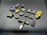 Bag of assorted pendants, pins, and charms