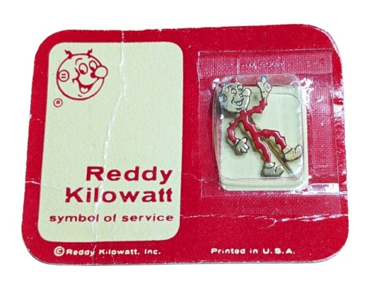 Vintage Reddy Kilowatt Pin new in packaging