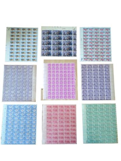 Nine sheets of vintage US stamps