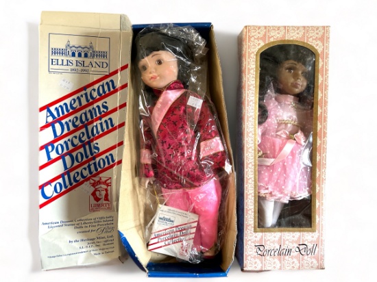 Pair of large vintage porcelain dolls in boxes