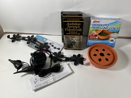 LOT - ASSORTED ITEMS - VHS, MOSQUITO REPELLING COILS, DÉCOR, PUMP, ETC
