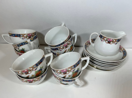 PCS - GERMAN TEA CUPS(10), SAUCERS(7), CREAMER (1)  - MATCHING FLORAL DESIG