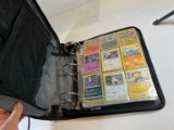 POKEMON CARDS ASSORTED (IN ZIP BINDER)