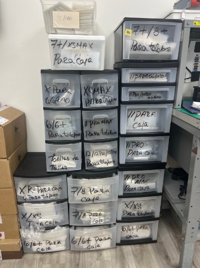 STORAGE CABINETS WITH ASSORTED IPHONE PARTS