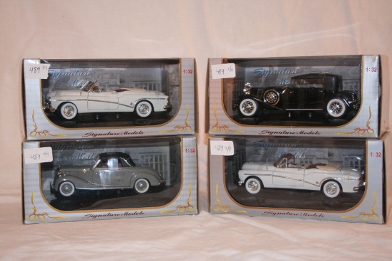 4 Die Cast Models in Box