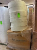 pallet of rolls of packing and yarn rolls