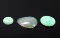 Group of Three Chinese Hardstone Pendants