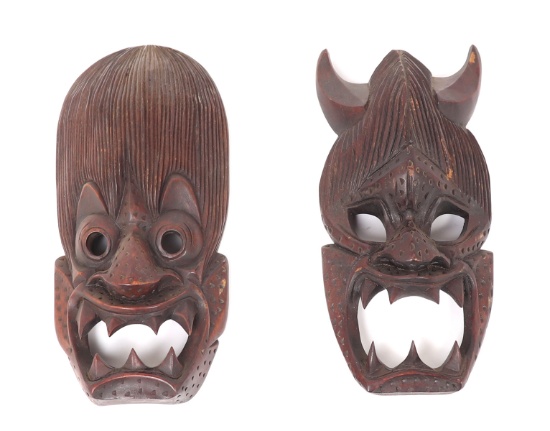 Two Wood Carved Tibetan Transformation Masks