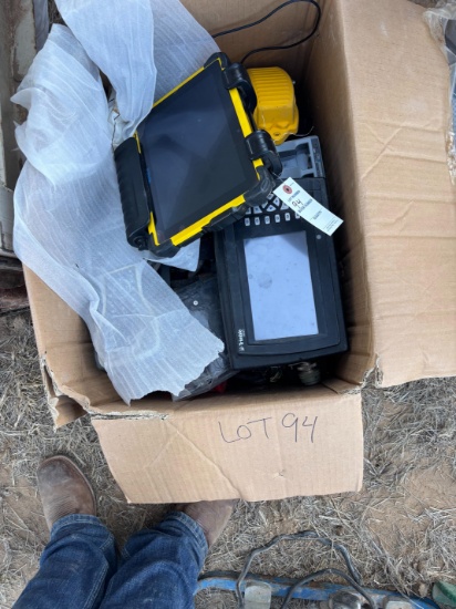 Box of Trimble Computers and cords