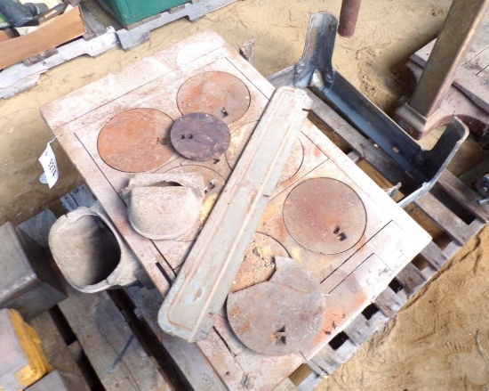 Pallet with old cook stove