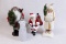 Santa Statues and Glass Snowman