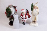Santa Statues and Glass Snowman