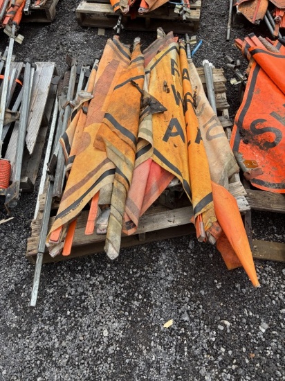 Lot of Stands & Road Work Signs