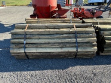 Lot of Wood Treated Tapered 4x7 Fence Posts