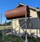 500 gallon tank on stand with nozzle