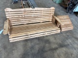wooden porch swing with foot stool
