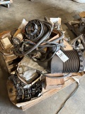 pallet of misc parts, manuals etc for rental equipment