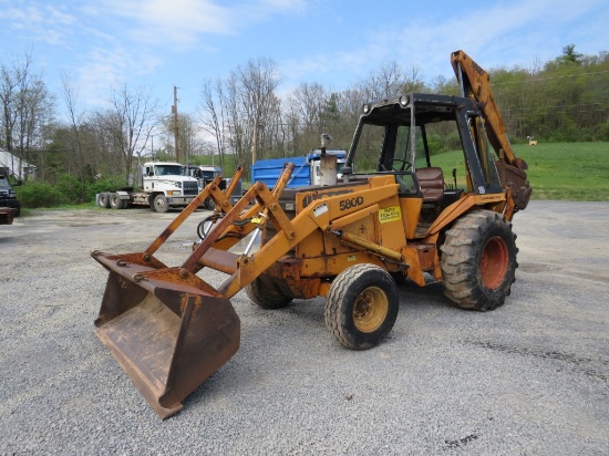 580 D Case backhoe, 16.9 x 24 rear tires, 24"