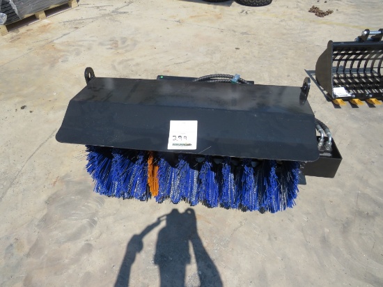 Sweeper for a mini skid steer