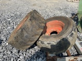 (2) Bobcat 12X16.5 Tires on 8 Lug Rims