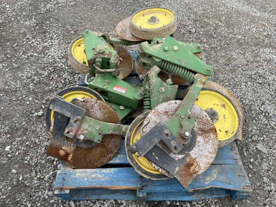 pallet of JD Planter row cutter Parts