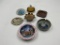 7 - ashtrays - 1 - 4 in tin bridal cave mo. , 1 - 4in brown scott prophestown, 4in coin, 1 - 4in tin