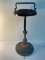 Ornate amber glass smoking stand