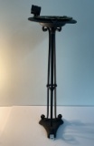 Wrought iron coin smoking stand