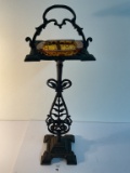 1930s ornate cast iron smoking stand