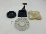 4 misc - Cast iron drunkman - marble aztec design - hull ashtray - glass clear tray