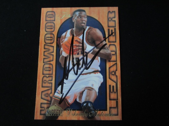 Dikembe Mutombo signed basketball card COA