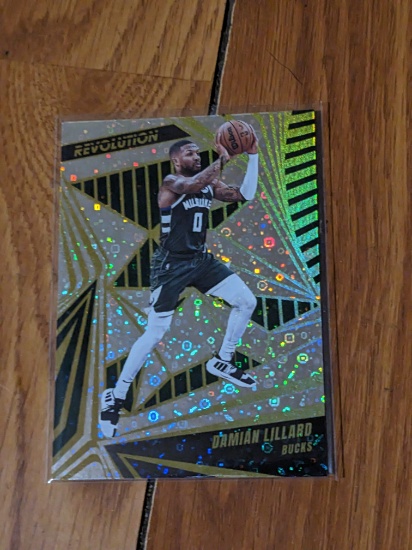2023-24 Panini Revolution Winter Damian Lillard Milwaukee Bucks yellow foil