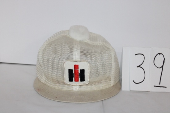 IH ladies mesh had with white pom pom and visor