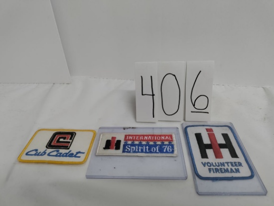 Lot: IH Volunteer Fireman Cub Cadet and IH Spirit of 76 sew-on patches