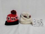 2 Unisex knit caps IH one white no pompom and one red & black with pompom