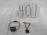 IH Chain of Quality tie clip and IH woman's clasp bracelet
