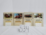 4 Showaker's IH Sales monthly calendars with personal tractor restorations
