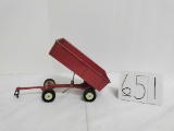 Ertl Red dump wagon with paint chips fair condition