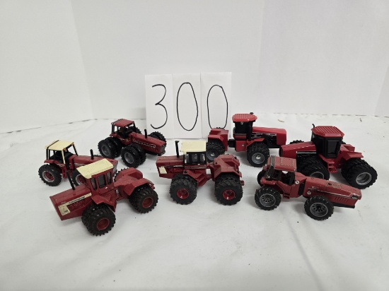 7 IH tractors 1/64 scale good condition in one box