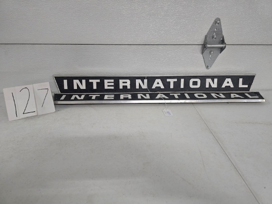 2 International emblems good condition