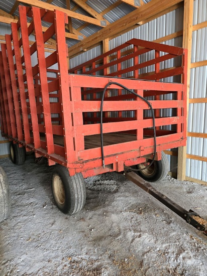 Dump hay wagon with 8 ton running gear orange