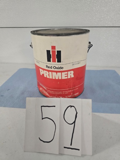 IH Red oxidized primer one gallon can full can never opened good condition some dents