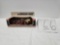 Ertl IH Farm set of one IH tractor and 3 implements in box which is in fair dcondition