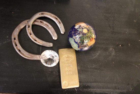 Paper Weights: Quartz globe, brass bar and glass and horse shoes